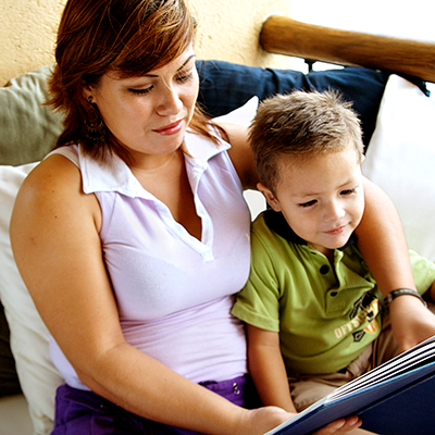 Mother reading to her child.