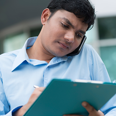 A city public health worker with a clipboard.